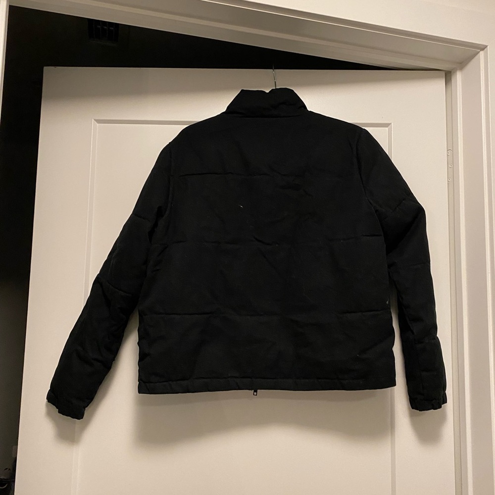 Black Puffer Jacket from Brandy Melville. Black in size Medium.